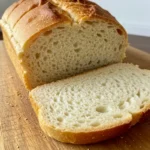 Freshly sliced white bread loaf close-up