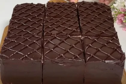 Delicious homemade chocolate cake with frosting and decorations